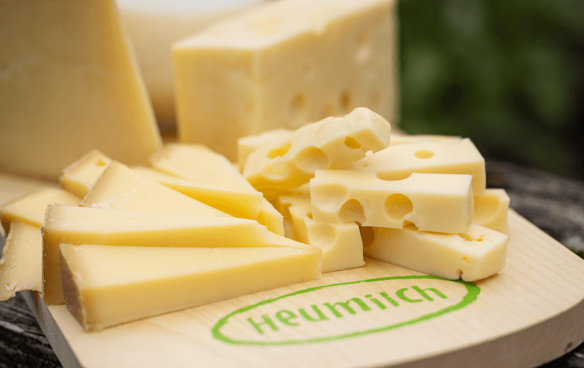 Das Heumilch-Logo: Grünes Licht für Umweltschutz und Tierwohl